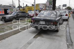 CARRIL DEL METROBÚS COMO ESTACIONAMIENTO
