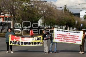 MANIFESTACIÓN . PARQUÍMETROS